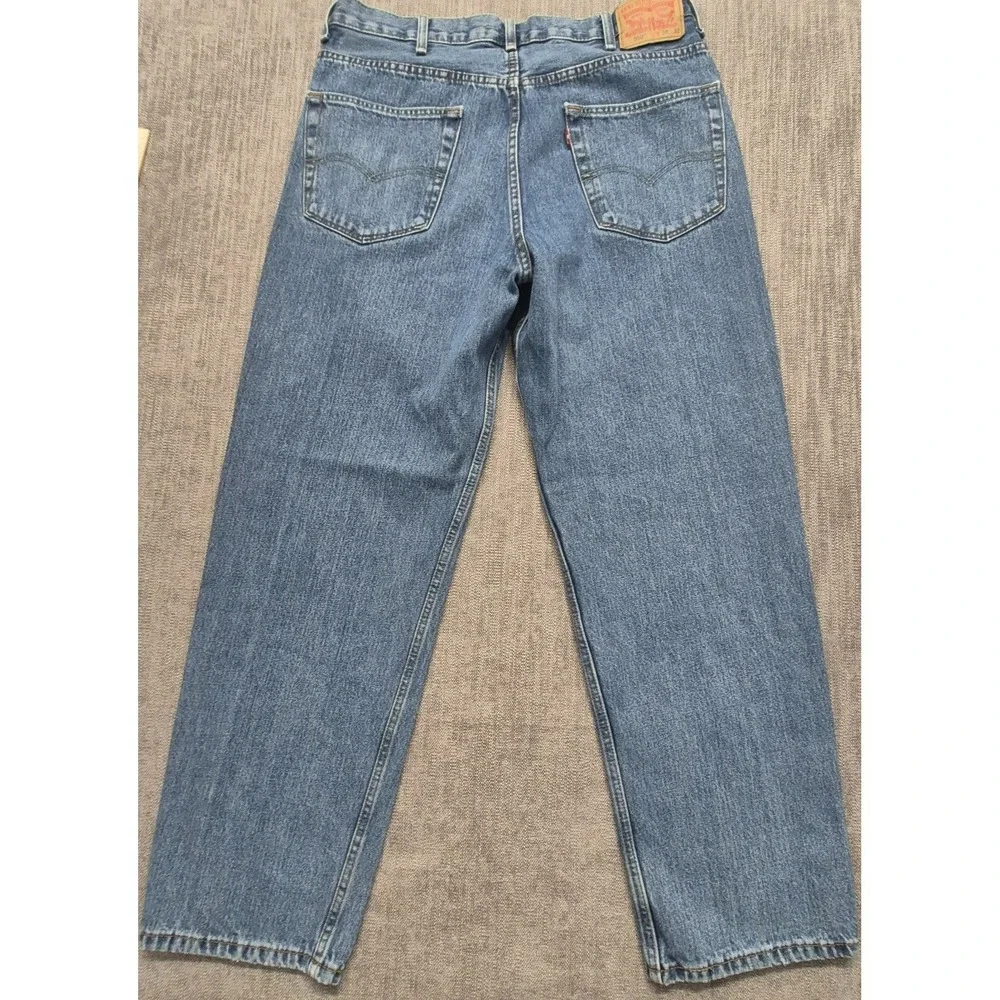 Levi 550 men's medium wash denim blue‎ jeans 38x32 Cotton straight leg